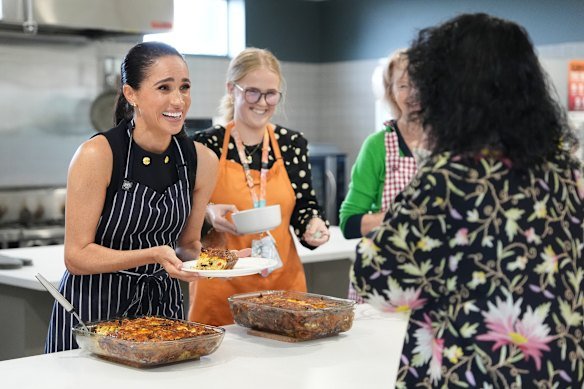 Meghan serves lunch at McAuley Community Services for Women in Footscray.