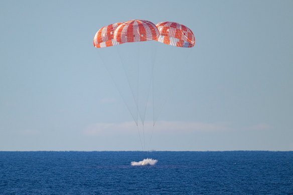 Artemis II splashes down in the Pacific Ocean.
