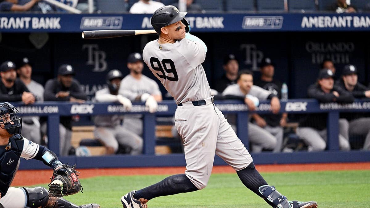 New York Yankees' Aaron Judge hitting a baseball during a game.