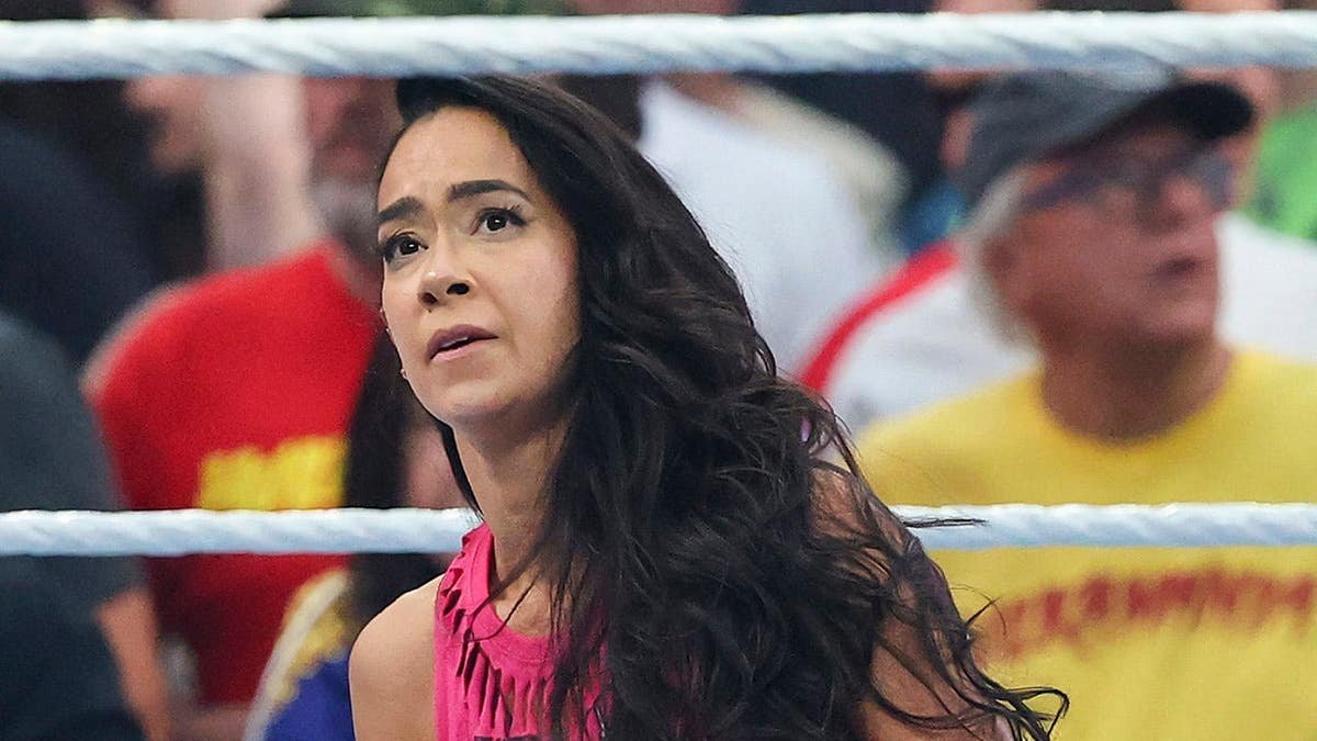 AJ Lee reacting after losing a wrestling match at Allegiant Stadium in Las Vegas