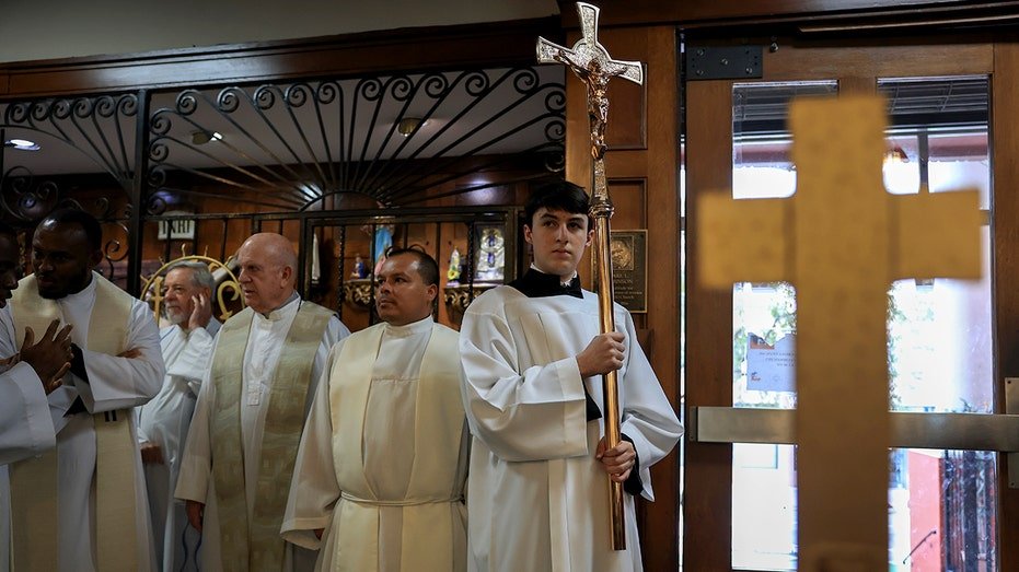 Catholic faith leaders gather for a mas