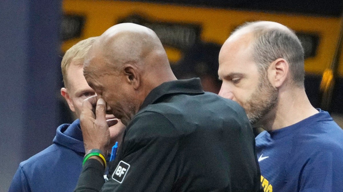 CB Bucknor with staff