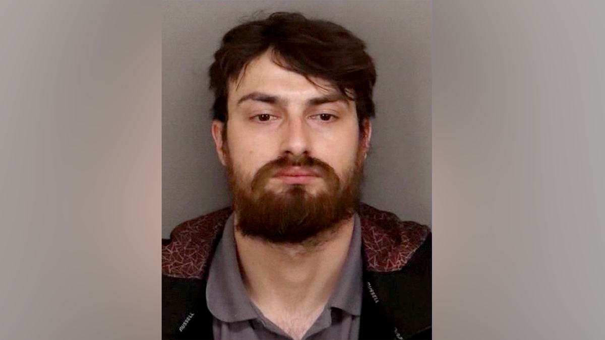 Chamel Abdulkarim mugshot following arrest in Ontario California warehouse arson case