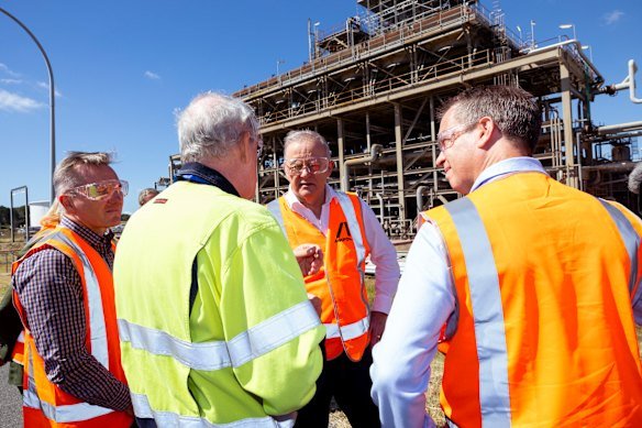 Prime Minister Anthony Albanese and  Energy Minister Chris Bowen (left) at Ampol’s Lytton Oil Refinery in Brisbane on Thursday.