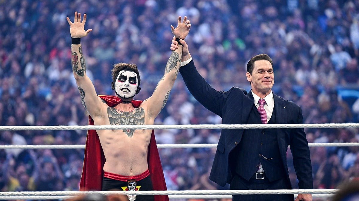 Danhausen and John Cena celebrating at Allegiant Stadium in Las Vegas