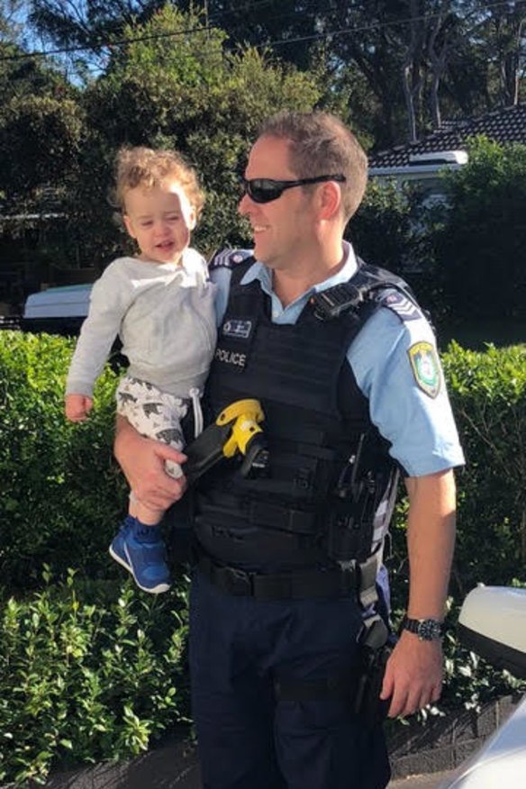 Justyn Backhouse with his son in 2018. 