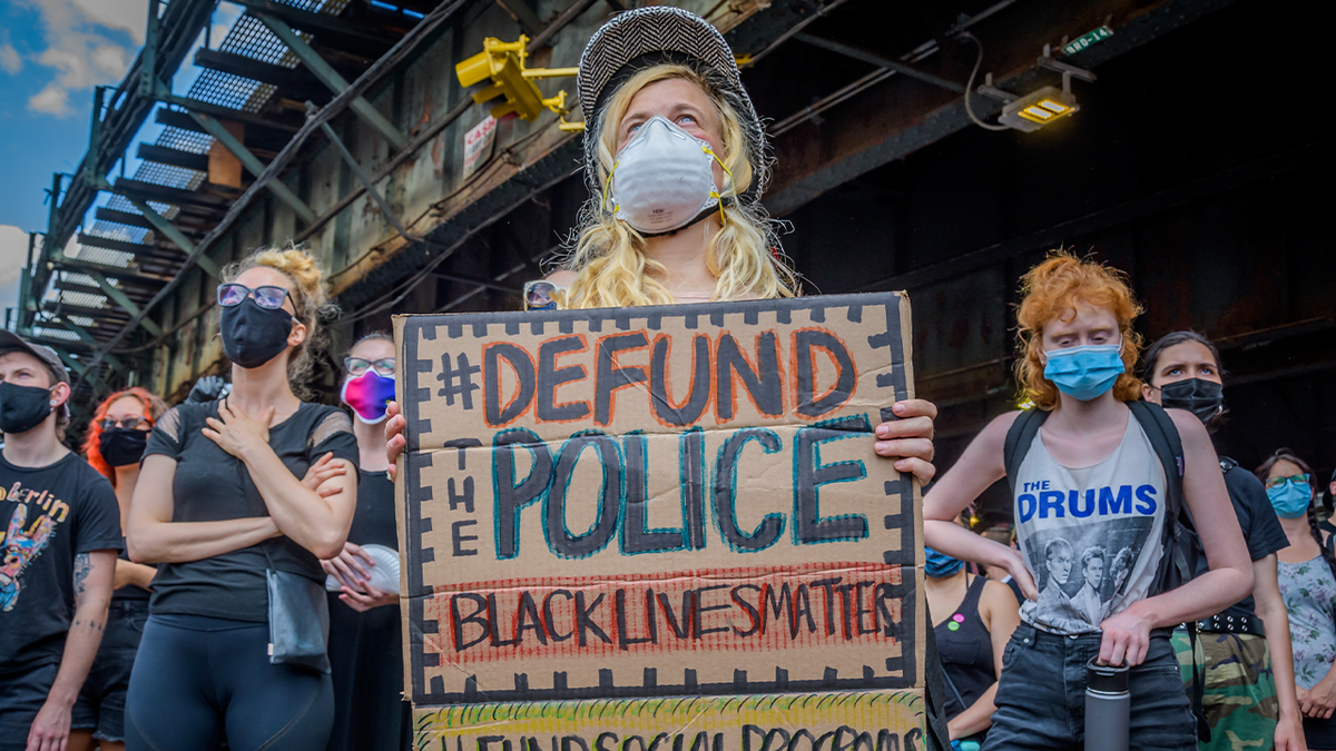 Defund the police activists marching in the streets of Brooklyn, New York