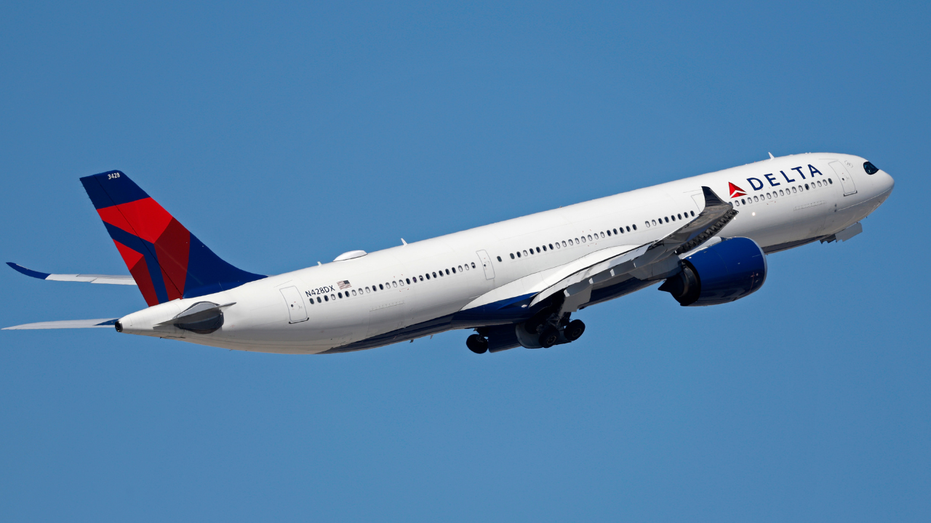 delta airlines plane in air