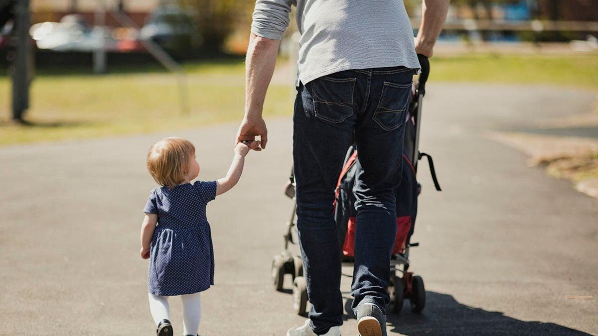 Man pushing a stroller