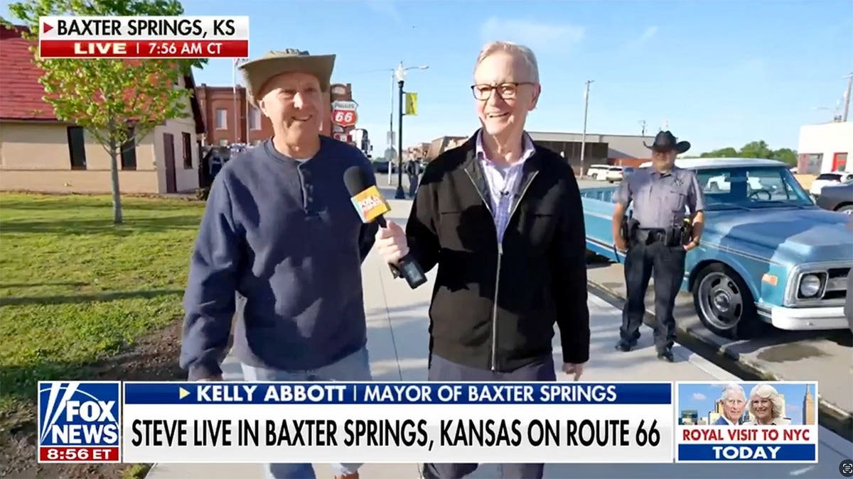 Steve Doocy interviewing Mayor Abbott outside in Kansas.