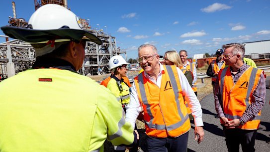 Prime Minister Anthony Albanese greeting a Queensland oil refinery worker on Thursday morning.