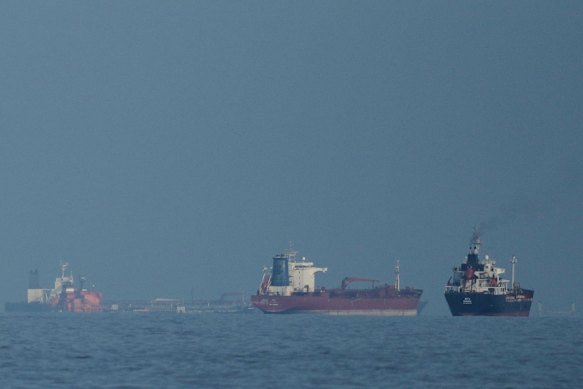 This March photograph shows oil tankers and cargo ships lining up in the Strait of Hormuz