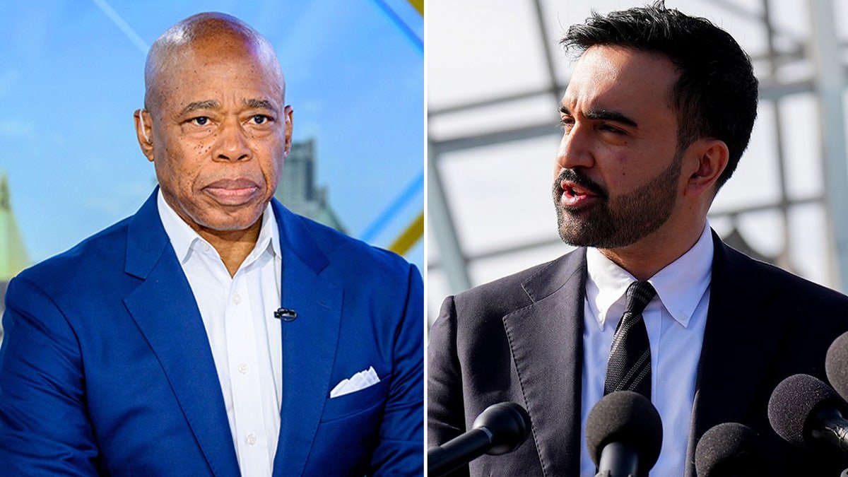 NYC Mayor Eric Adams and mayor-elect Zohran Mamdani standing together