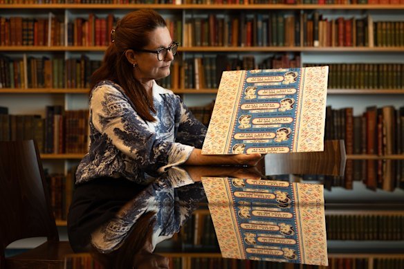 Curator Elise Edmonds with an old waxed bread wrapper. The State Library of NSW will soon open a new exhibition of treasures from the collection to mark its 200th anniversary.