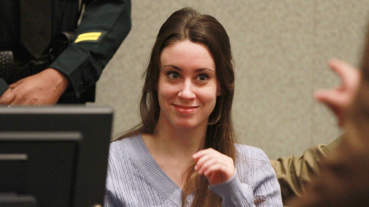 Casey Anthony smiling in courtroom at Orange County Courthouse in Orlando Florida