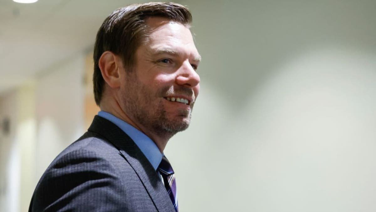 Rep. Eric Swallwell walking into a closed-door deposition room in Washington, D.C.