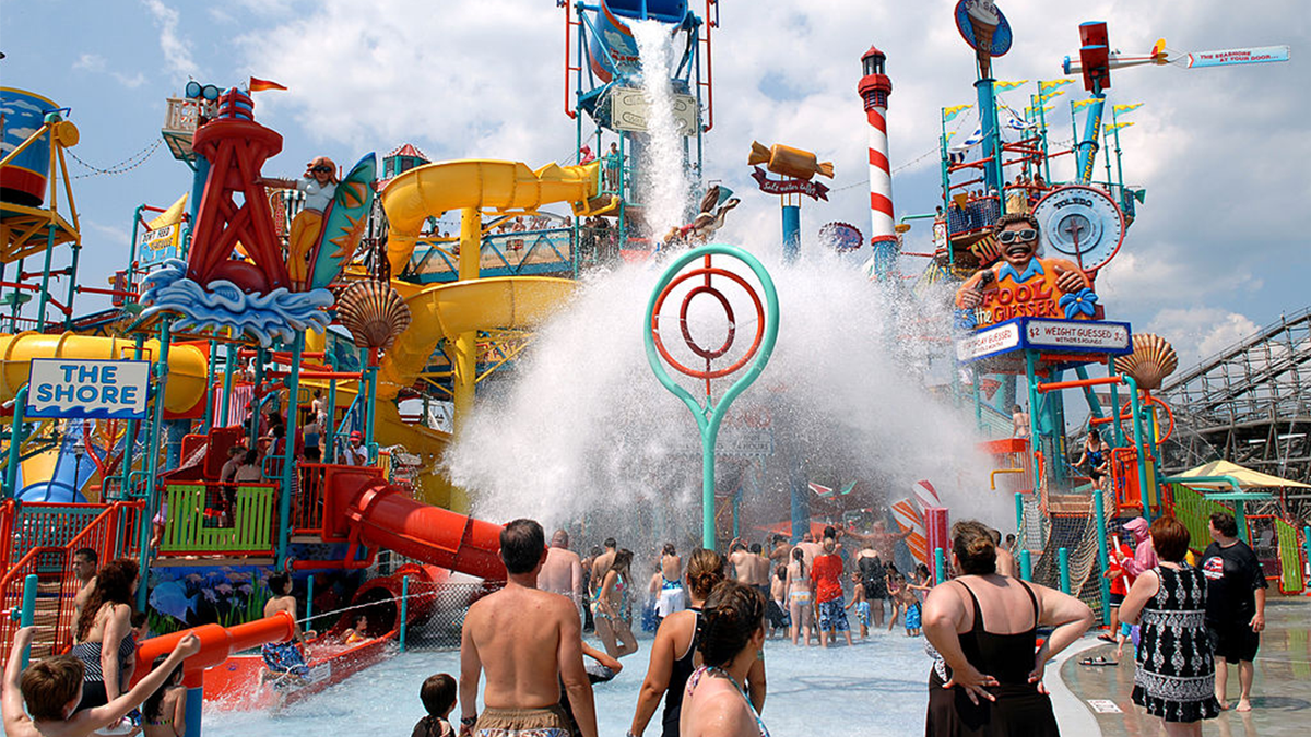 The Boardwalk at Hersheypark with water attractions and visitors