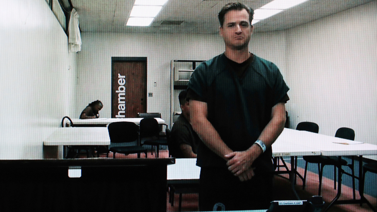 Gerhardt Konig in a jumpsuit while appearing for court.