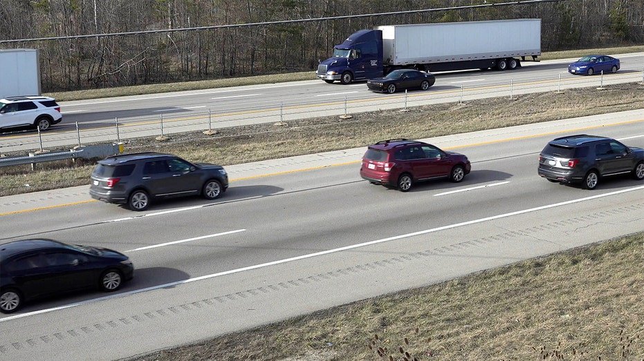 cars driving on road