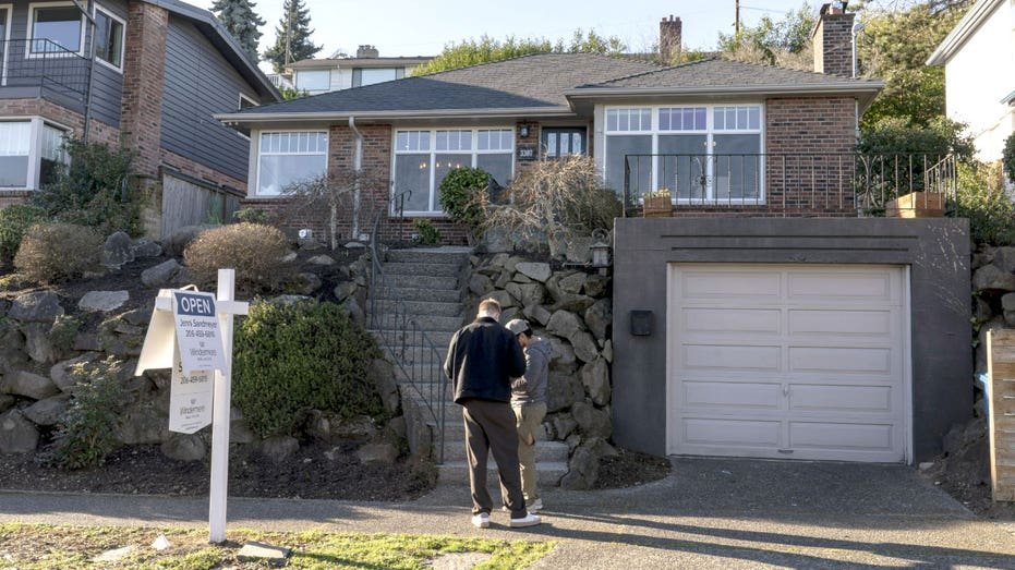 People outside a home.