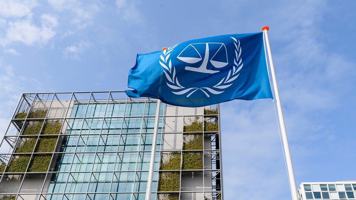 Flag with International Criminal Court logo flying in Den Haag Netherlands