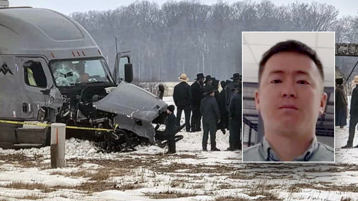 Bekzhan Beishekeev standing and looking forward