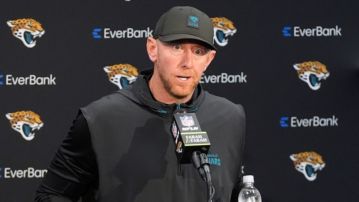 Jacksonville Jaguars head coach Liam Coen talking to reporters