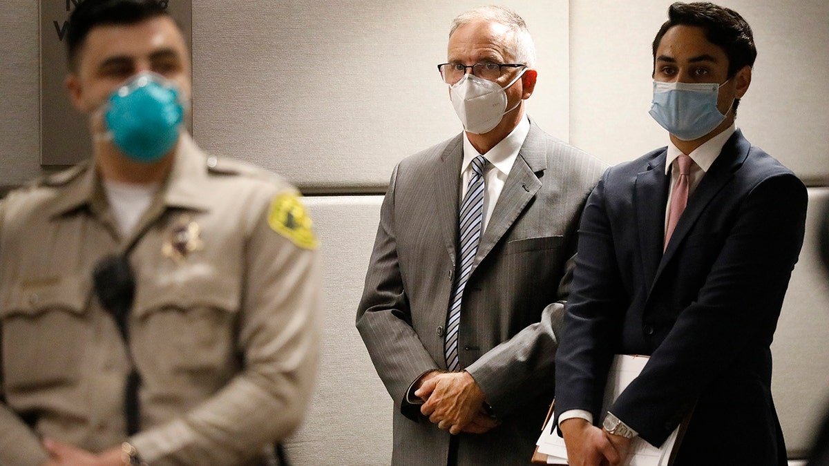 James Heaps wearing a coronavirus mask in a courtroom