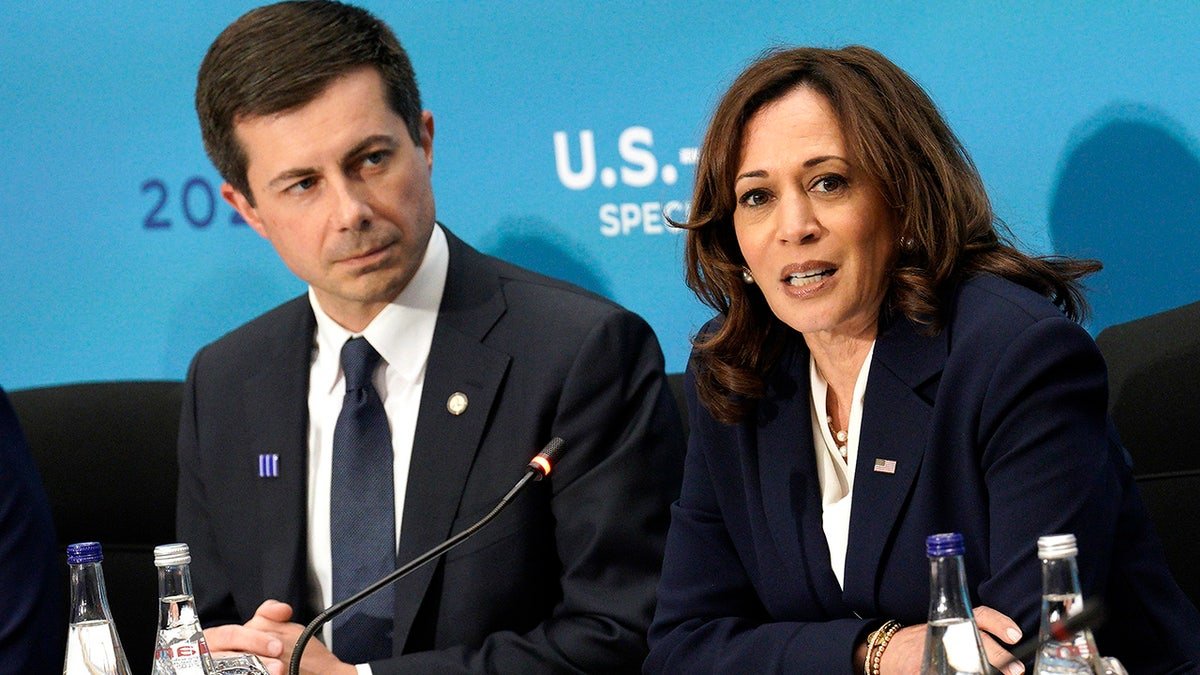 Then-Vice President Kamala Harris speaking with Pete Buttigieg at the State Department in Washington