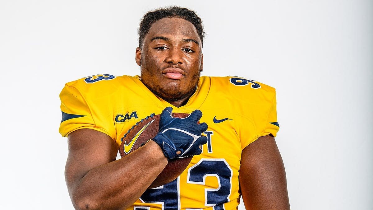 Kelvin Broadhurst Jr. standing in football uniform during 2024 A&T football picture day