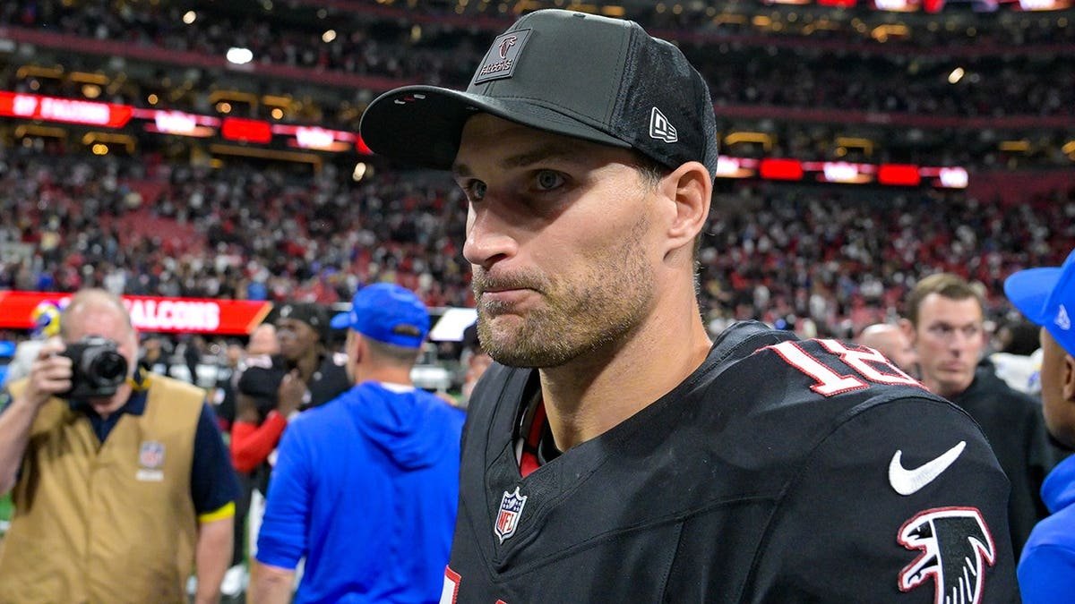 Atlanta quarterback Kirk Cousins reacting on the field at Mercedes-Benz Stadium