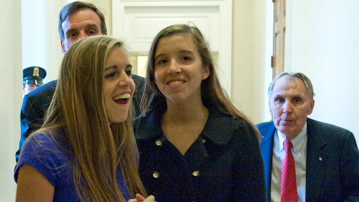 Mark Warner walking with daughters Madison and Eliza in the U.S. Capitol