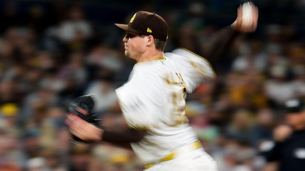 San Diego Padres pitcher Mason Miller pitching against Colorado Rockies batter