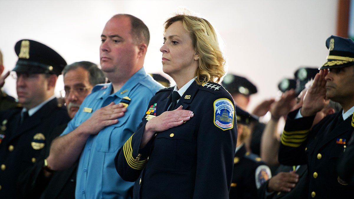 Police officers Matthew Mahl and Cathy Lanier attending an event.