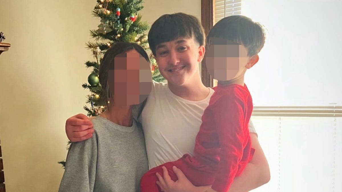 Miles Young with family members in Missouri prior to fatal ambush