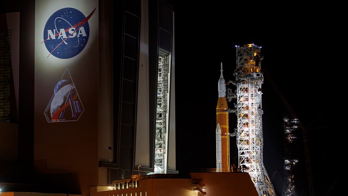 The Artemis 2 Space Launch System rocket rolling to Launch Complex 39 Pad B at Kennedy Space Center