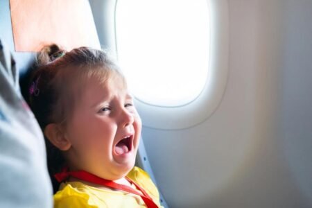 Former flight attendant shares controversial take on why families with small children should board planes last
