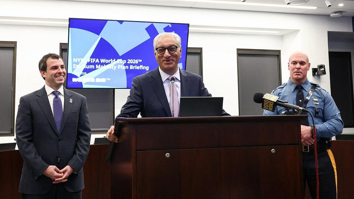 NJ Transit CEO Kris Kolluri speaking with Alex Lasry at a press briefing in Newark, New Jersey