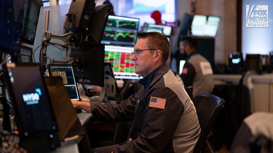 Traders on the floor of the New York Stock Exchange.