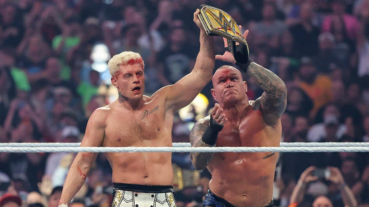 Randy Orton steals the belt from Cody Rhodes during a wrestling match at Allegiant Stadium