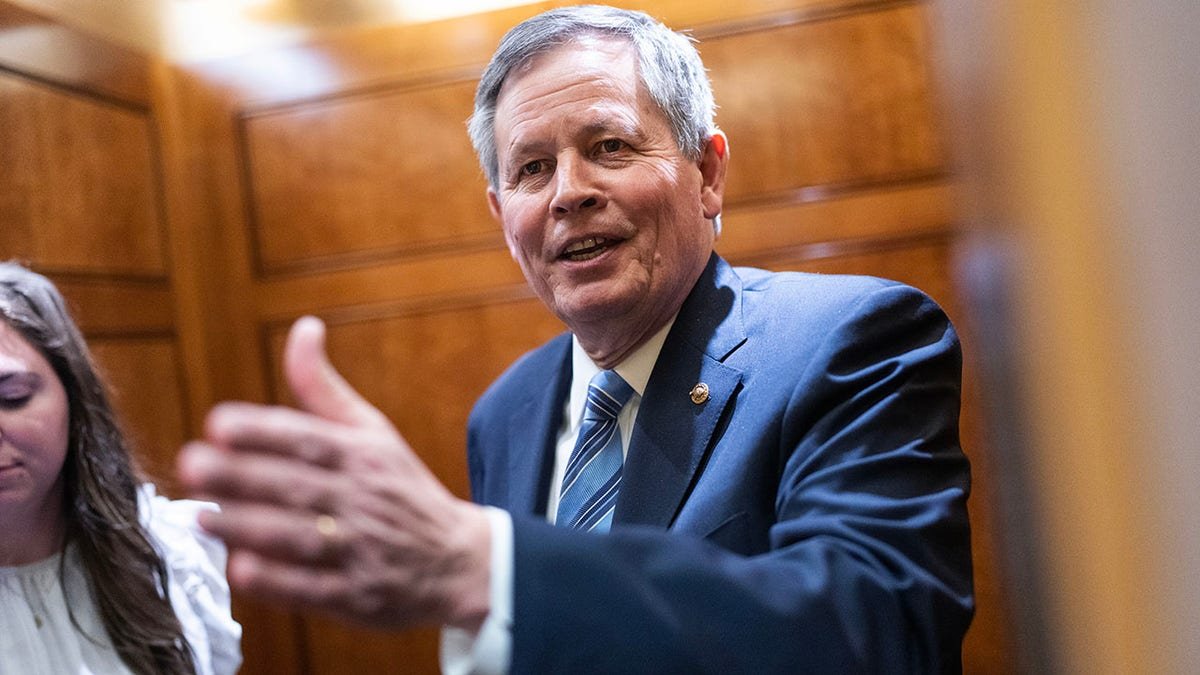 Sen. Steve Daines standing in the U.S. Capitol during votes