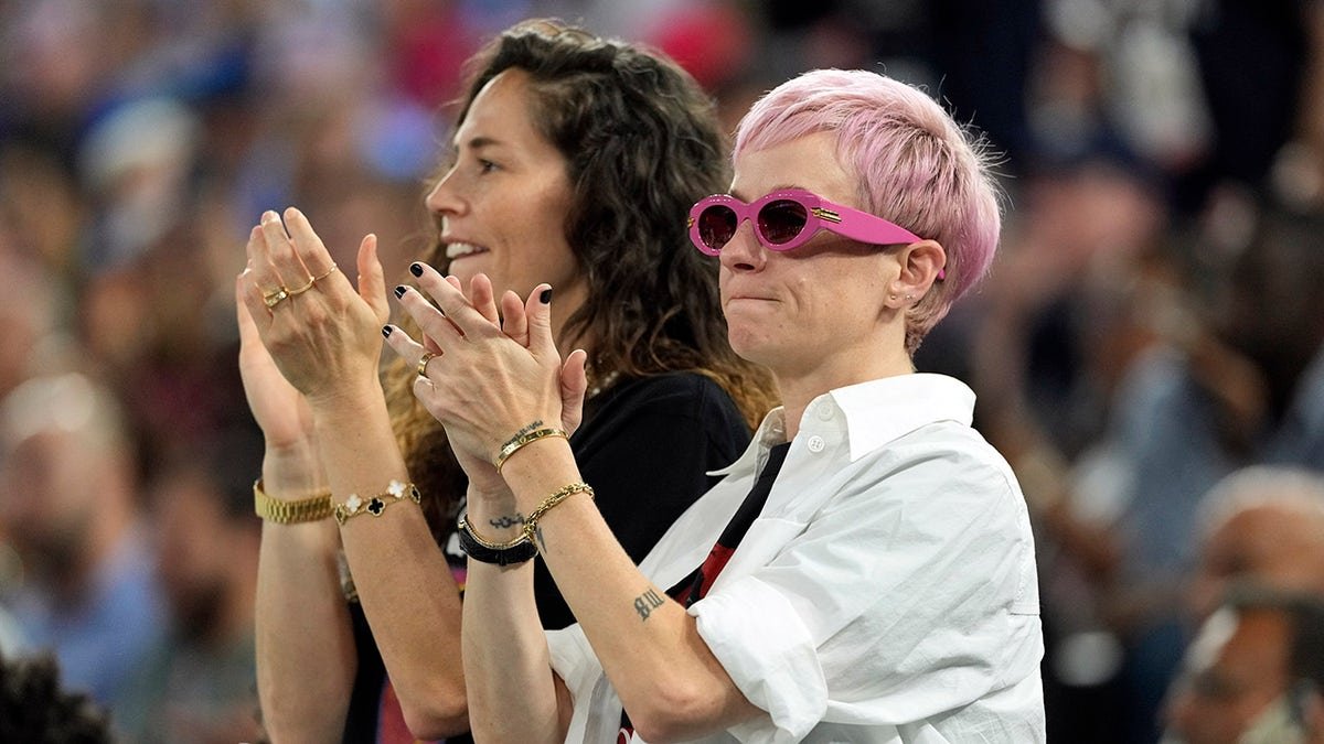 Sue Bird and Megan Rapinoe watching men's basketball gold medal game at Accor Arena