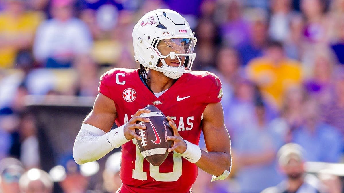 Arkansas Razorbacks quarterback Taylen Green looking to pass during a game at Tiger Stadium