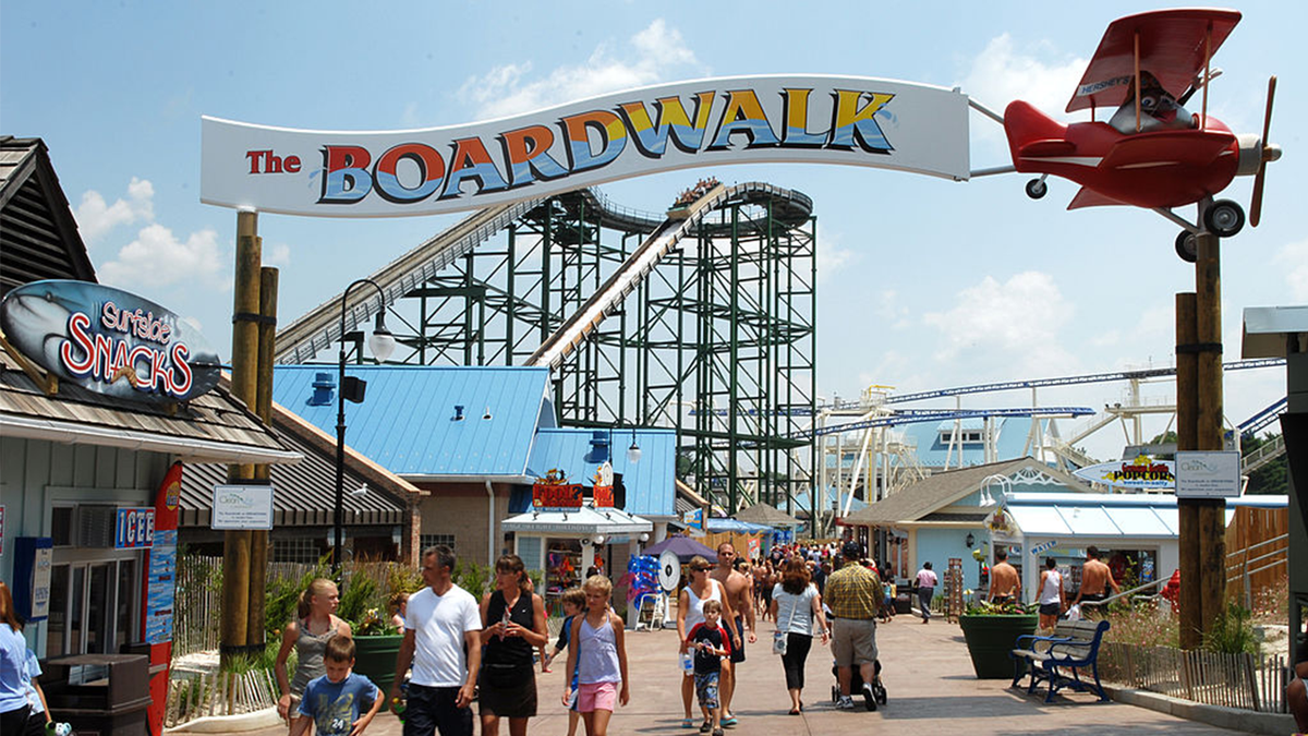 The Boardwalk at Hersheypark with water rides and guests
