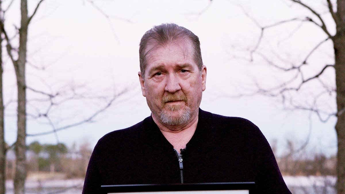 Tim Jones Sr posing for a portrait photograph.
