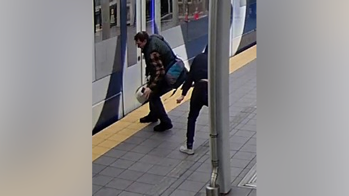 Train enters station as suspect allegedly times push toward tracks in Seattle incident