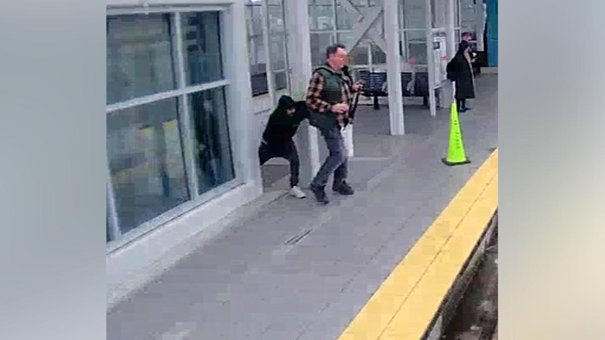 Victim stumbles forward after being pushed near edge of train platform in Seattle
