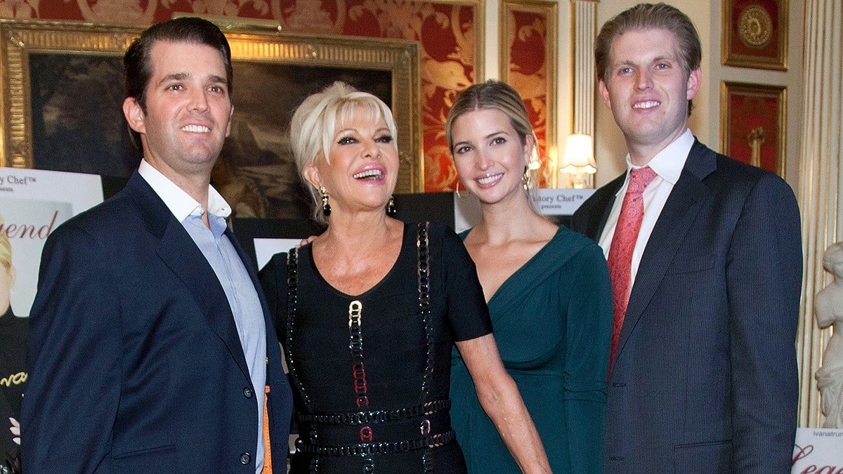 Donald Trump Jr., Ivana Trump, Ivanka Trump, and Eric Trump standing together at an event