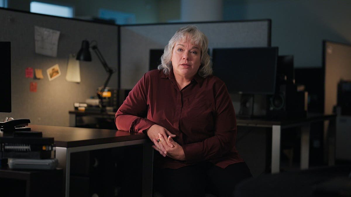 Special Agent Dawn Martin standing in a scene from Trust Me: The False Prophet Season 1