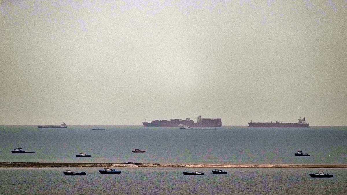 Fishing boats and cargo ships sailing in the Arabian Gulf near the United Arab Emirates